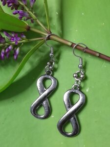 earrings featuring infinity sign piece